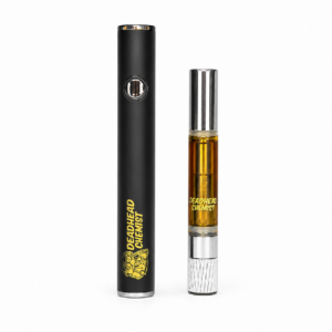 Close up of an integrated one milliliter clear cell next to a compact battery power source